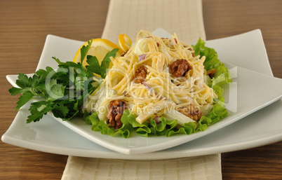 Salad with cheese and apple, walnuts and yogurt