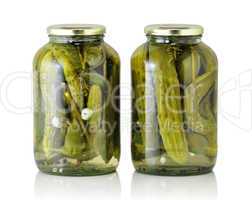 Glass jars with pickled cucumbers