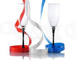 colorful  streamers and two empty glasses