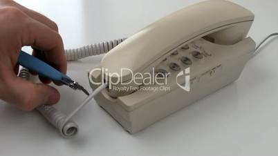 Cutting landline telephone cable