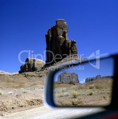 Monument Valley with reflection of Merrick Butte in mirror