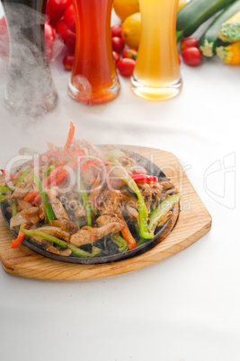 original fajita sizzling hot  on iron plate