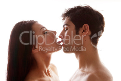 Couple Enjoying Erotic Kiss