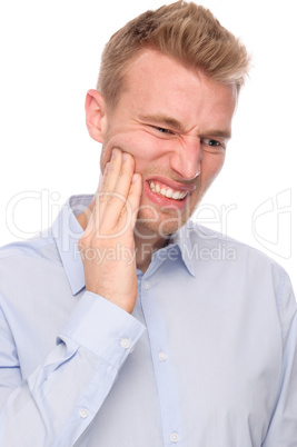 Mann mit Zahnschmerzen