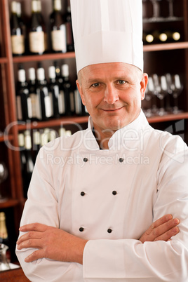 Chef cook confident professional posing restaurant