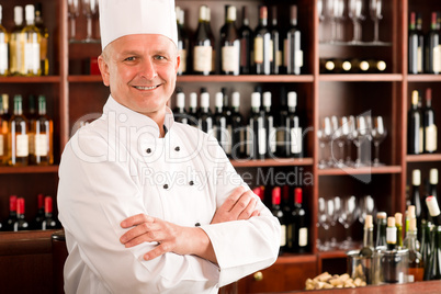 Chef cook confident professional posing restaurant