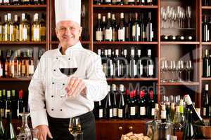 Chef cook smiling serve wine glass restaurant