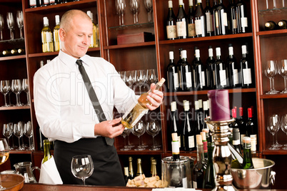 Wine bar waiter happy male in restaurant