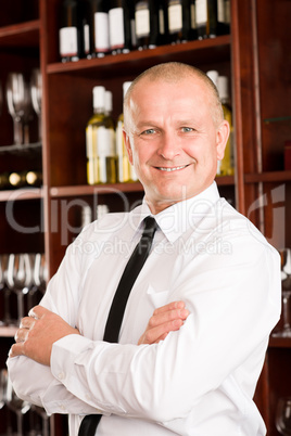 Wine bar waiter happy male in restaurant