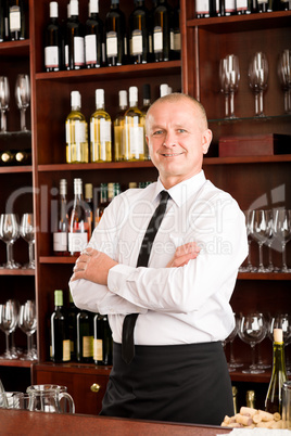 Wine bar waiter happy male in restaurant