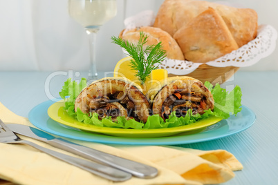 Herring fillets baked with mushrooms and cheese