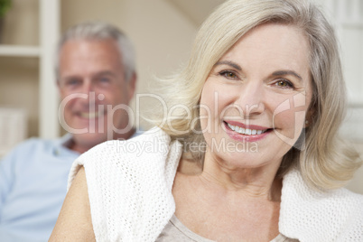 Happy Senior Man & Woman Couple Smiling at Home