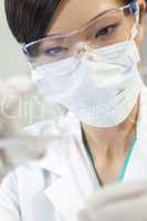 Chinese Female Woman Scientist With Test Tube In Laboratory