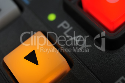Macro shot of the "Play" and "Record" buttons