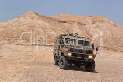 Israeli army Humvee on patrol in the Judean desert