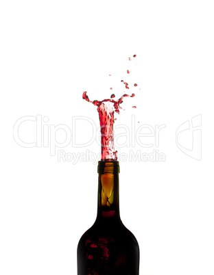 Red Wine shooting from green bottle