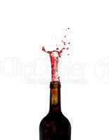 Red Wine shooting from green bottle