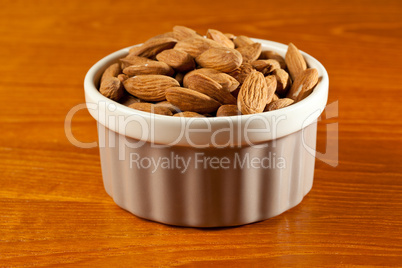 Raw organic almonds in bowl