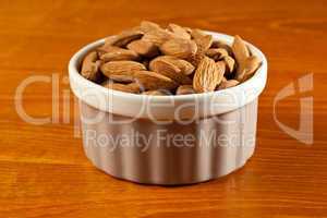 Raw organic almonds in bowl