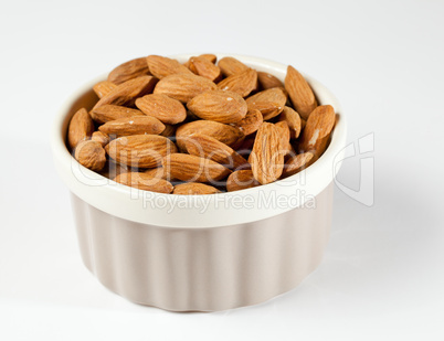 Raw organic almonds in bowl