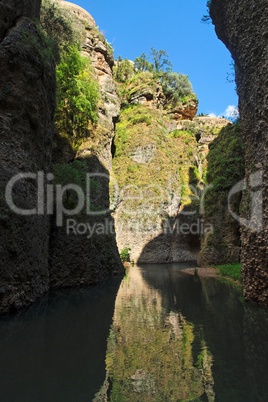 Narrow river gorge in Ronda, Spain
