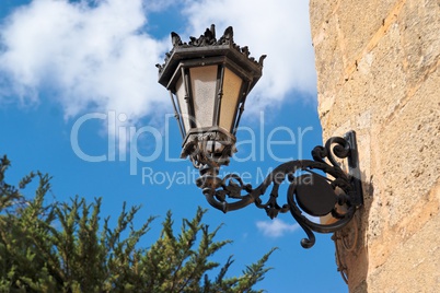 Retro street lantern on sky background