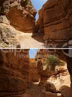 Narrow slot between two rocks in desert canyon