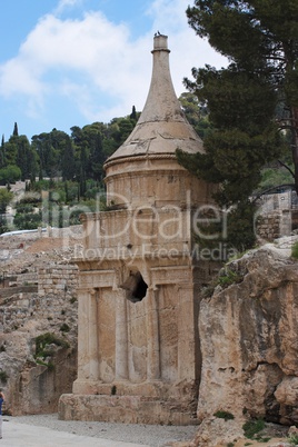 Ancient Tomb of Absalom in Jerusalem with two birds on top