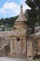 Ancient Tomb of Absalom in Jerusalem with two birds on top
