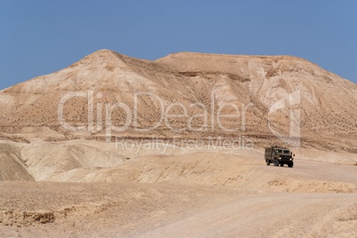 Israeli army Humvee on patrol in the Judean desert