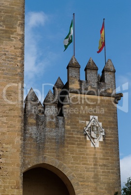 Almodovar Del Rio medieval castle with flags of Spain and Andalusia