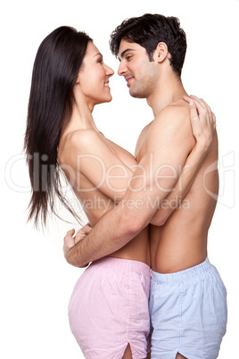 Smiling Couple In Loving Embrace