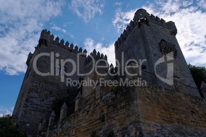 Silhouette of Almodovar Del Rio medieval castle on cloudy sky background