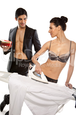 Man Giving Gift To Woman In Lingerie