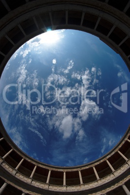 Fisheye view of sky above Palacio de Carlos V in Granada, spain