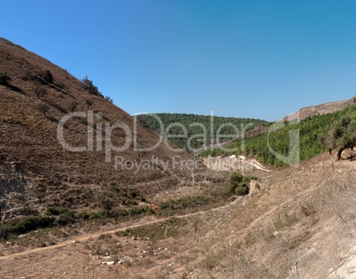 Hiking track between Mediterranean hills