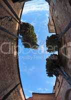 Sky above the court of Medieval castle upward view