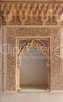 Carved door in the Alhambra palace in Granada, Spain