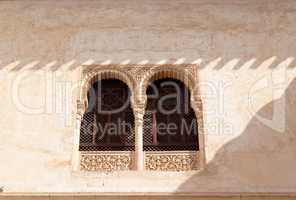 Arched window in Alhambra palace in Granada, Spain