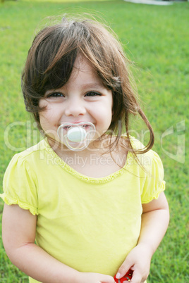 baby girl with pacifier