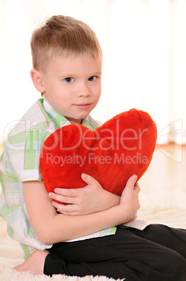 child with a plush heart