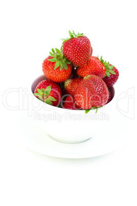 strawberries in a bowl in the daylight