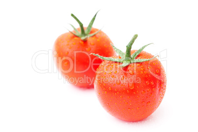 tomato with water drops isolated on white