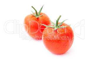 tomato with water drops isolated on white