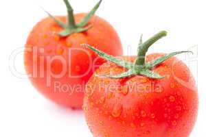 tomato with water drops isolated on white