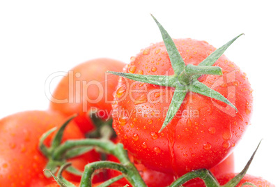tomato with water drops isolated on white