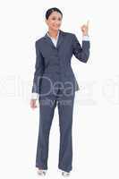 Businesswoman pointing up