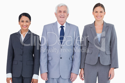 Three smiling businesspeople Three smiling businesspeople