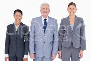 Three smiling businesspeople