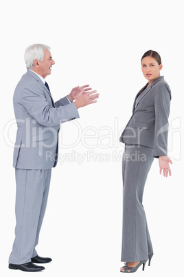 Businesswoman getting accused by colleague